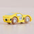 Yellow toy car with wooden wheels on a light beige background