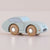 Toy car with wooden wheels on a beige background