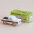 Wooden toy truck with a green box labeled 'Le Toy Van' on a beige background