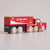 Red toy truck with wooden wheels on a beige background, branded 'Le Toy Van'.