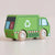 Green toy recycling truck with wooden wheels on a light background