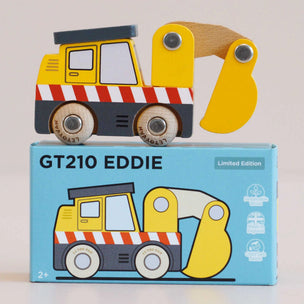 Wooden toy excavator with a matching box on a light gray background