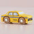 Toy taxi car with wooden wheels on a beige background