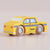 Toy taxi car with wooden wheels on a beige background
