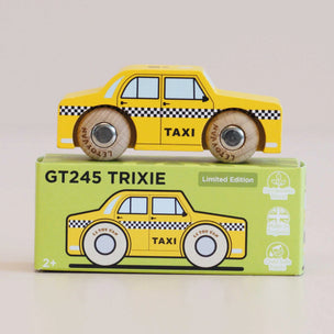 Toy taxi car on top of its packaging box with 'GT245 TRIXIE' branding.