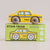 Toy taxi car on top of its packaging box with 'GT245 TRIXIE' branding.