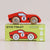 Wooden toy car with 'GT25 Finley' packaging on a light beige background