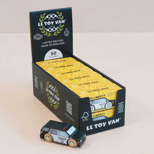 Le Toy Van toy car packaging with a single toy car in front on a light background