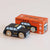 A wooden toy taxi car in front of its orange retail box, photographed on a clean light beige studio background. The box reads 'LE TOY VAN' and 'GT275 BERTIE Limited Edition'.