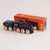 Wooden toy train with 'GT295 Francis' branding next to its packaging on a light background