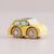 Yellow toy car with wooden wheels on a beige background