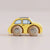 Yellow toy car with wooden wheels on a beige background