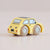 Yellow toy car with wooden wheels on a beige background