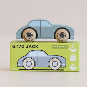 Wooden toy car on top of its packaging box with 'GT70 JACK' branding.