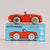 Red toy car on top of its packaging box with 'GT75 Marc' branding.