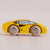 wooden yellow toy car on grey back ground 