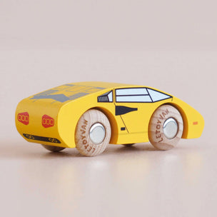 yellow wooden toy car