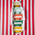 Colorful tie with vintage van design on a red and white striped background