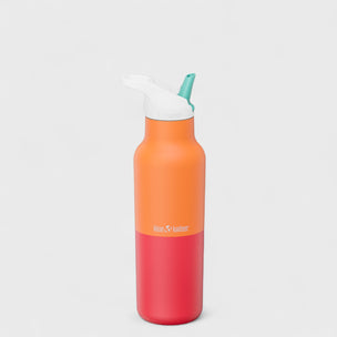 Two-toned orange and red water bottle with a white straw lid on a light gray background