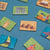 Small square tiles with various illustrations on a blue background