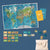 World map poster with educational cards and a tote bag on a blue background