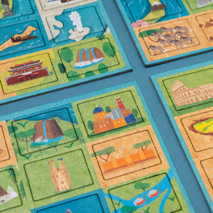 Children's educational puzzle with colorful illustrations of landmarks and landscapes.