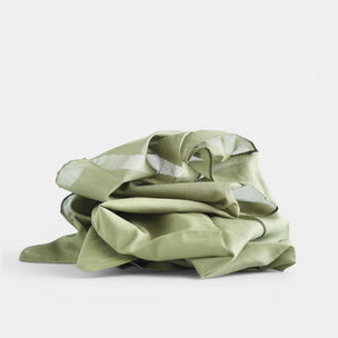 Laura's Play Cotton 90x90 | Olive GreenFolded green fabric on a white background