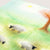Sheep pattern on a colorful fabric background