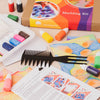 Marbling kit with combs, bottles, and instructions on a table