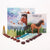 The 'Hrókur and the Skyriders' book, Ostheimer Pony and Grapat Set arranged on a white background, including the illustrated book, a wooden horse toy, and rows of coloured wooden pieces.