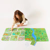 girl pointing to silk play map