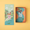 Two travel-themed boxes with illustrations of tropical and Egyptian landscapes on a yellow background.