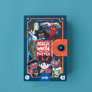 Magic World Love and Logic Puzzle box by Ignijli Puzzles, featuring a dark blue cover with whimsical cartoon characters and an orange clasp closure, set against a solid teal background.