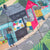 Children's puzzle with illustrated scene of a street and buildings