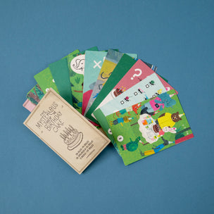 Set of colorful greeting cards with various designs on a blue background