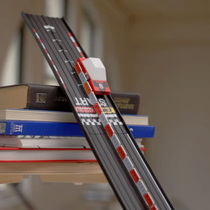 Model road set on a stack of books with a blurred background