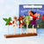 Felt character puppets on sticks with a 'Room on the Broom' book in the background.