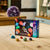 Box of gemstone collection on a wooden table with gemstones around