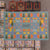 A flat-lay view of a Grapa advent calendar, showing the central decorated box with the brand name 'GRAPAT' and surrounding numbered boxes on a concrete floor.