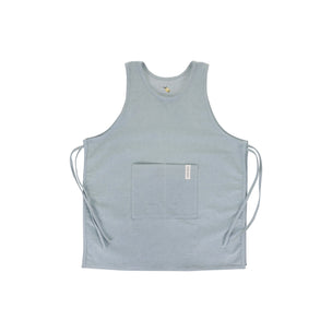 Light blue sleeveless shirt with a pocket on a white background