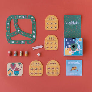 Board game components including cards and pieces on a red background