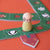 Board game piece on a colorful board with a house and cat illustration