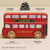 Red double-decker toy bus with gold paint details, made in England by Le Toy Van.