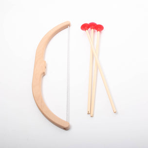 Wooden bow and arrow with red nocks on a white background