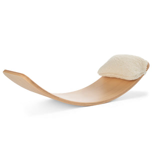 Teddy Wobbel pillow in off white  on a Natural Wobbel balance Board | Conscious Craft
