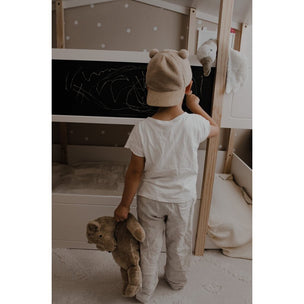 Boy holding large bear