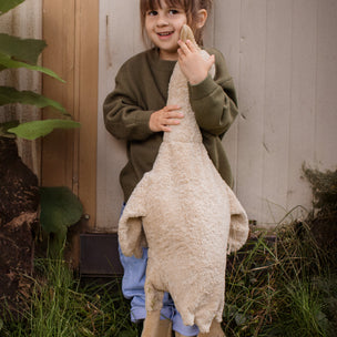 Girl with large linen goose
