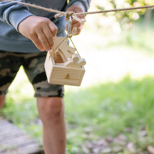 child with pully box