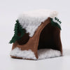 Snowy felt stump house from Ambrosius