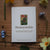 Note card with 'Honeysuckle' design and text on a wooden surface with flowers.